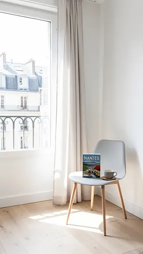 Bright minimal interior with a window and soft daylight, calm travel mood, subtle Nantes vibe, clean composition, editorial travel photography, high resolution, natural colors